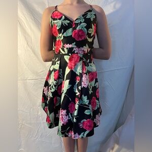 B. Smart Black Dress with Pink Floral Design